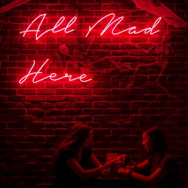 all mad here neon sign