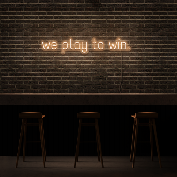 we play to win neon sign