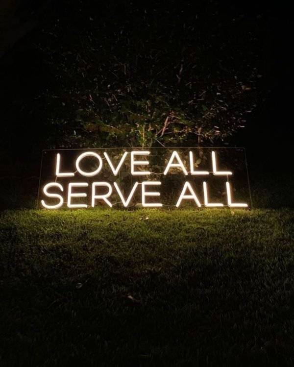 love all serve all neon sign