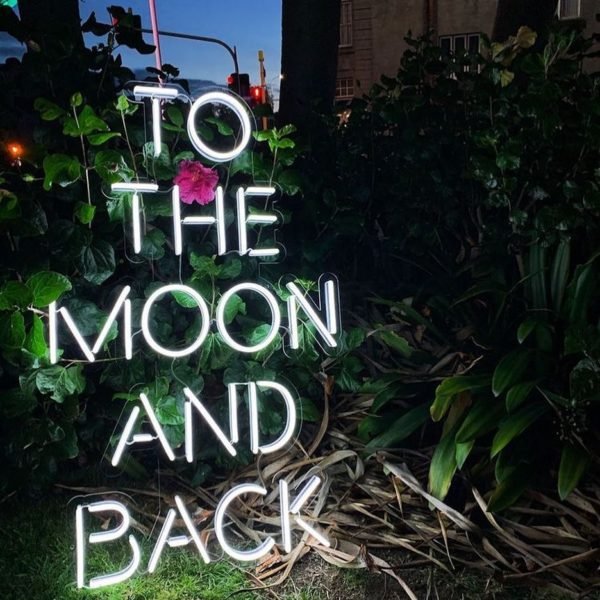 to the moon and back neon sign